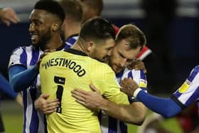 Sheffield Wednesday goalkeeper Keiren Westwood and Tom Lees celebrate a much-needed victory against Coventry City (Picture: PA)