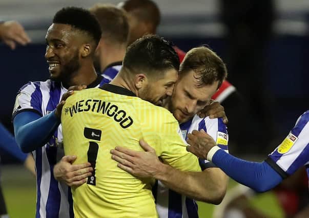 Sheffield Wednesday goalkeeper Keiren Westwood and Tom Lees celebrate a much-needed victory against Coventry City (Picture: PA)