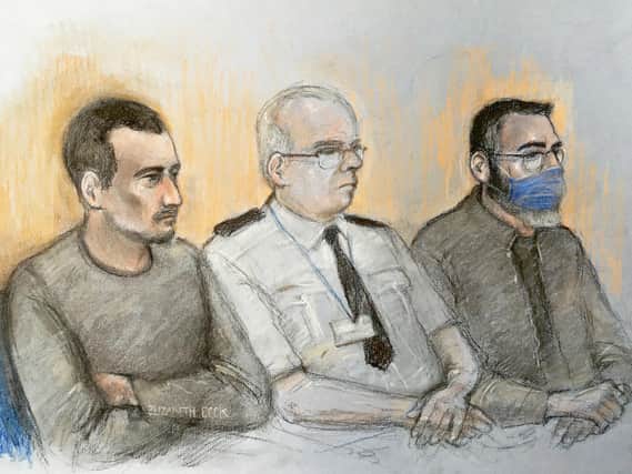 Court artist sketc by Elizabeth Cook of Christopher Kennedy (left) and Valentin Calota (right) two of four men to face trial, at the Old Bailey in London, for being part of an alleged people-smuggling ring linked to the death of 39 migrants in a lorry in Essex