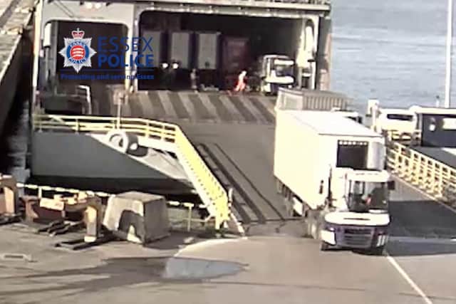 CCTV issued by Essex Police showing dock workers loading a trailer, believed to contain 39 Vietnamese migrants, onto ship in Zeebrugge, Belgium