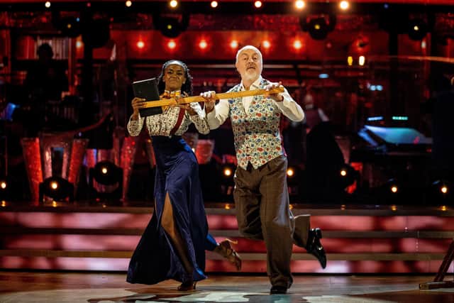 Bill Bailey and his dance partner Oti Mabuse and Bill Bailey winning the final of Strictly Come Dancing 2020.
