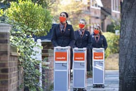 Library image of cabin crew celebrating easyJet's 25th birthday