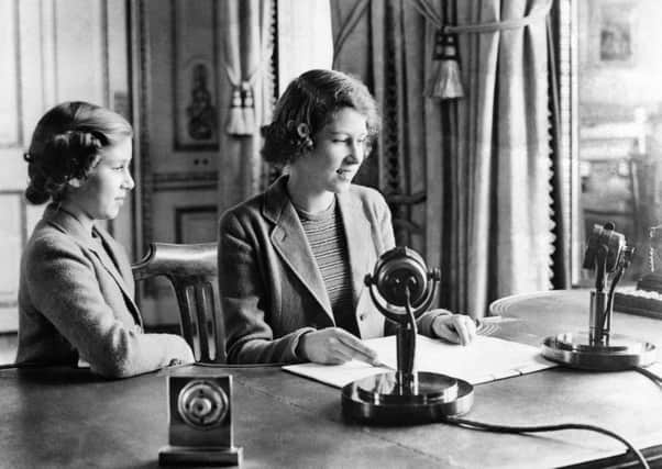 This was a young Princess Elizabeth (right) delivering her first speech in October 1940. By her side is her younger sister Princess Margaret.