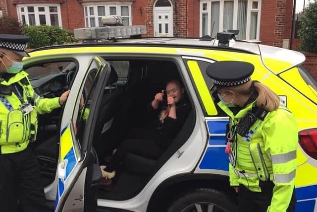 15-year-old Emily Richardson who is 'obsessed with police' had her wish of 'being arrested' and getting to ride in a police car come true