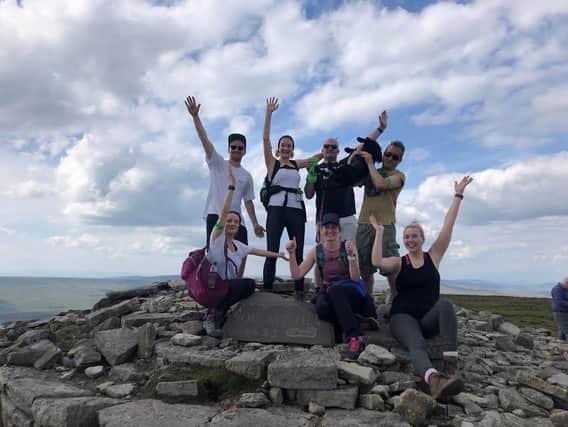 Some of the Clarion team reach the summit of Ingleborough as part of the Yorkshire Three Peaks Challenge