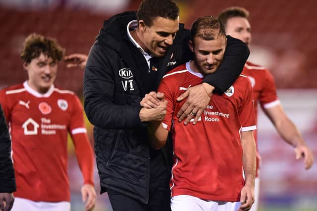 GOOD GOING: Valerien Ismael manager of Barnsley celebrates a recent win with Herbie Kane Picture: Nathan Stirk/Getty Images.