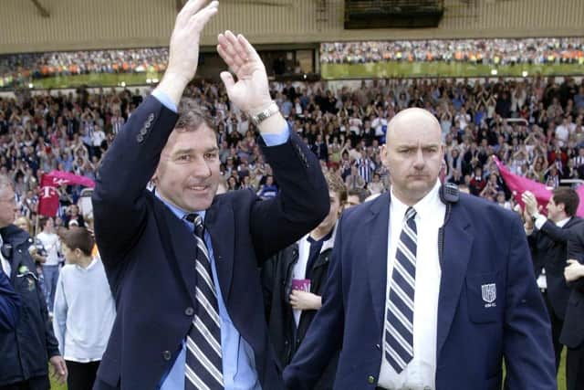 West Bromwich Albion's manager Bryan Robson (L) celebrates with fans at The Hawthorns after securing Premier League survival back in May 2005. Picture: Nick Potts/PA.