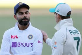 Hard lines: Steve Smith talks to Virat Kohli at the conclusion of the first Test at Adelaide Oval. Picture: Getty Images
