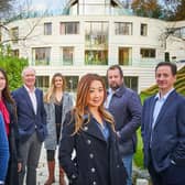 Agents from Sotheby International Realty outside a £40m home that features in Channel 4's Britain's Most Expensive Houses