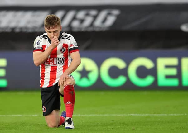 Ben Osborn of Sheffield Utd looks on dejected after the final whistle (Picture: Andrew Yates/Sportimage)