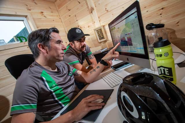 Analyse this: Dean and Russ Downing, who have turned their skills to coaching and set up Downing Cycling. Pictures: Bruce Rollinson