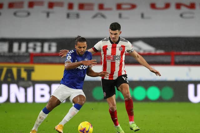 FIGHTING TALK: Sheffield United's John Egan tussles with Everton's Dominic Calvert Lewin at Bramall Lane on Boxing Day. Picture: Simon Bellis/Sportimage