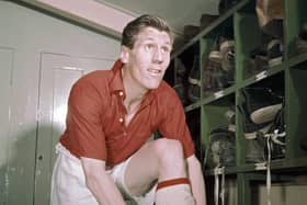 Bradford Park Avenue, Newcastle United, Sunderland and England footballer Len Shackleton puts his boots on in the dressing room circa 1957. (Picture: Allsport/ Don Morley/Getty Images)