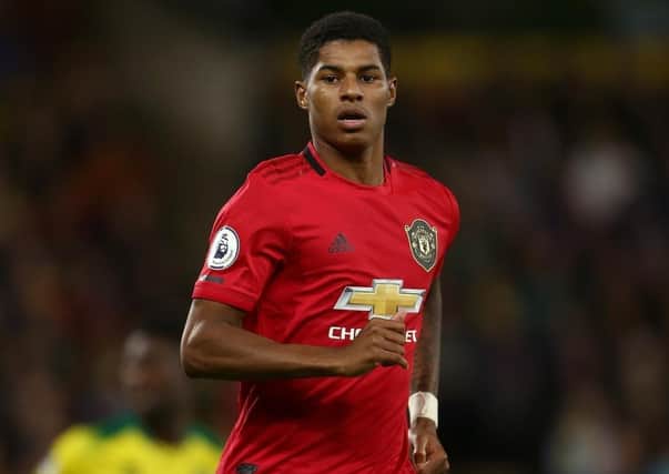 SHINING EXAMPLE: England and Manchester United striker Marcus Rashford led the fight for free school meals, while others such as Jordan Henderson, Billy Sharp and Harry Maguire set charity example. Picture: PA