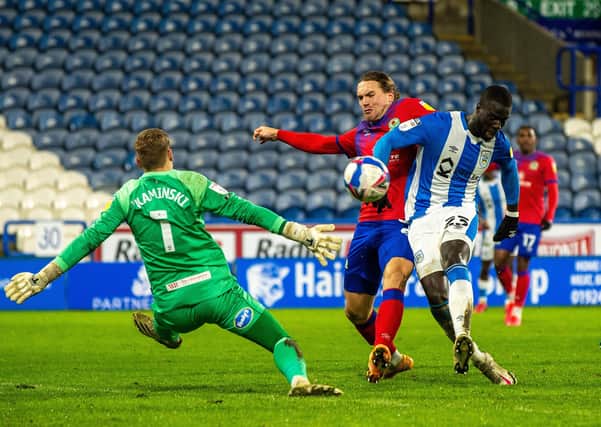 LATE DRAMA: Naby Sarr scores his second  Huddersfield Town goal against Blackburn Rovers.  Picture: Bruce Rollinson