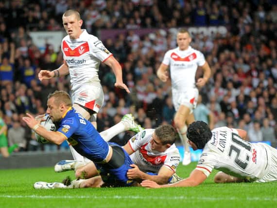 Rob Burrow scores his most famous try, in the 2011 Grand Final. Picture by Bruce Rollinson.