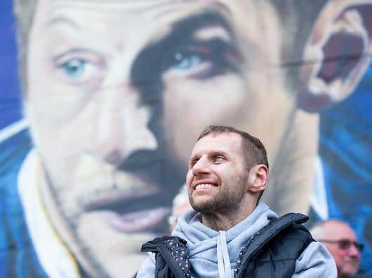 Rob Burrow in front of a mural of him at Leeds University. Picture by Allan McKenzie/SWpix.com.