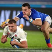 England's Henry Slade dives in to score his sides fifth try during the Guinness Six Nations match against Italy in Rome. Picture: Marco Lacobucci/PA
