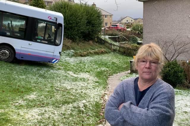 Mandy Rutter and the bus in her garden.
CC Bruce Rollinson/JPI Media