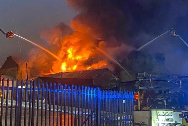 Firefighters have been working hard in bitterly cold conditions this morning to tackle a large building fire in Annison Street, Bradford.