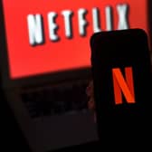 Many people have spent hours watching Netflix during the pandemic. (Photo by OLIVIER DOULIERY/AFP via Getty Images)