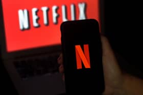 Many people have spent hours watching Netflix during the pandemic. (Photo by OLIVIER DOULIERY/AFP via Getty Images)