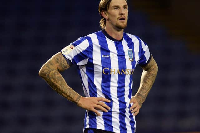 INJURY: Aden Flint's final Sheffield Wednesday appearance saw him pick up a hamstring strain at Rotherham United