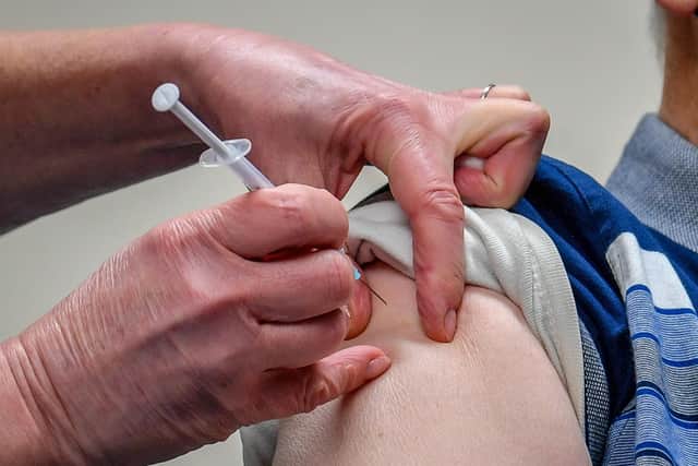A single dose of the Oxford University/AstraZeneca COVID-19 vaccine is given to a patient. Photo: Ben Birchall/PA Wire