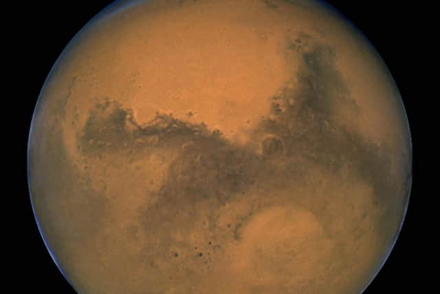 Pictured, an image captured by NASA's Hubble Space Telescope shows a close-up of the red planet Mars. Photo credit: Getty