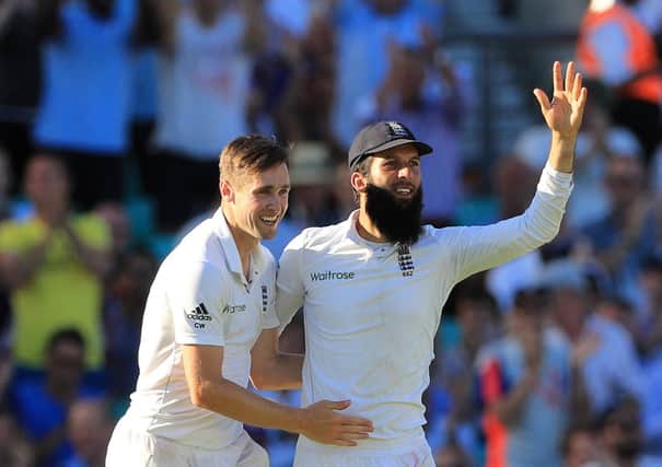 England's Moeen Ali has tested positive for Covid-19 at the start of the tour to Sri Lanka is now in a 10-day isolation period. Chris Woakes, left, has been identified as a potential close contact and will serve seven days in isolation. Picture: John Walton/PA