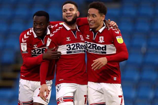 Middlesbrough's Marcus Tavernier (right) celebrates scoring his side's second goal at Wycombe. Picture: Bradley Collyer/PA