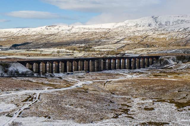 The magnificent Ribblehead Viaduct this week. Engineers working on the iconic Ribblehead Viaduct this week. ByLine: Charlotte Graham. Copyright: ©2020 CAG Photography Ltd.