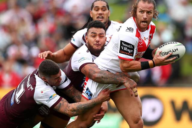 Korbin Sims, of St George-Illawarra Dragons, is tackled by Manly Sea Eagles in 2019. (Photo by Cameron Spencer/Getty Images)