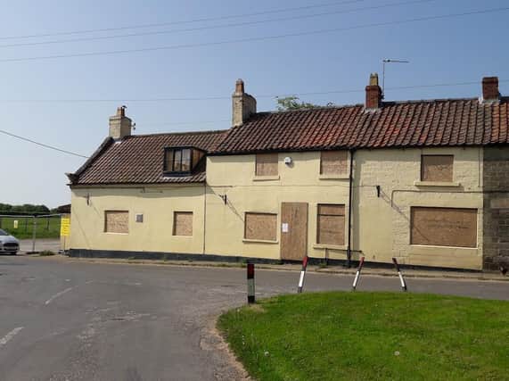 The Plough Inn is empty and derelict