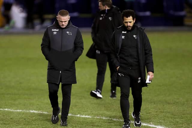 Derby County caretaker coach Wayne Rooney and assistant Liam Rosenior will be absent as the Rams field a team filled with Under-23s to fulfil their FA Cup fixture following a breakout of coronavirus at the club. Picture: Richard Sellers/PA