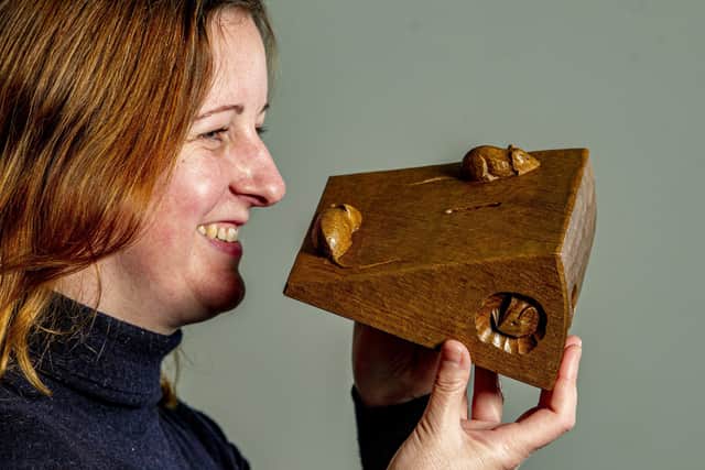 Diane Sinnott at Tennants Auctioneers in Leyburn with a Mouseman carving. Picture: Tony Johnson