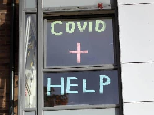 A sign in the window of student accommodation, taken during the pandemic. Universities across Yorkshire have reported a raft of new measures put in place to help students across the region, including many social media initiatives. Photograph: Mike Egerton/PA