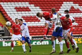Barnsley's Michal Helik scores the opening goal against Tranmere Rovers (Picture: Jonathan Gawthorpe)