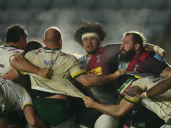 Harlequins' Elia Elia and Joe Marler as a scrum breaks up during the Gallagher Premiership Rugby match against London Irish at Twickenham Stoop on January 10. (Photo by Steve Bardens/Getty Images)
