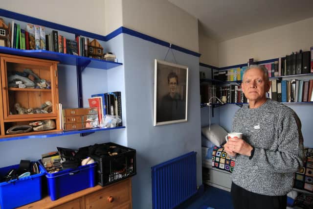 Kevin Gosden pictured at home in his son's bedroom, which has remained unaltered since he was reported missing in 2007