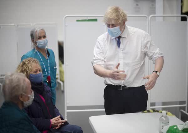 Boris Johnson visits one of the new regional vaccine centres in Bristol.