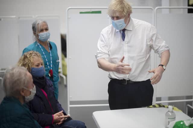 Boris Johnson visits a regional vaccine centre in Bristol.