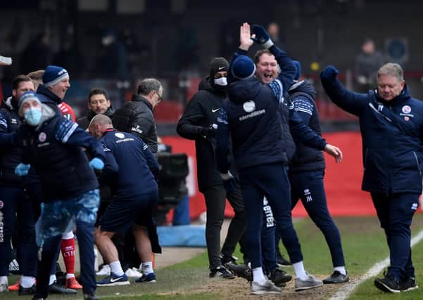 Over-exuberant according to rules: Marcelo Bielsa turns away as the Crawley management celebrate victory over Leeds. Picture: Simon Hulme