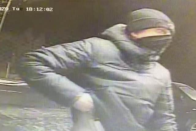 Police are keen to speak to the man in the CCTV image in connection with the armed robberies.