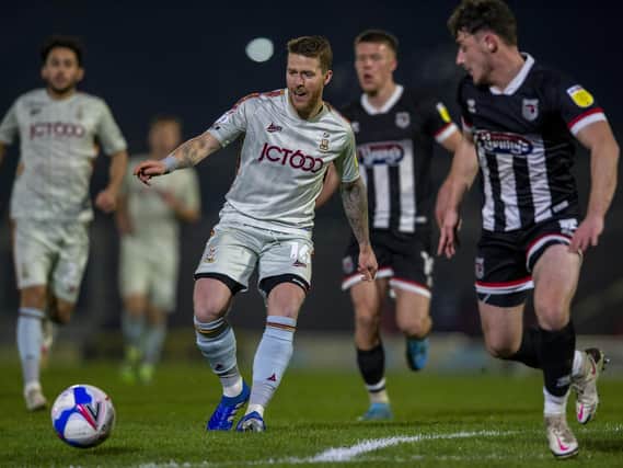 REARRANGED: Bradford City's Billy Clarke plays against Grimsby Town in December. The original September date was rescheduled because of a Covid-19 case