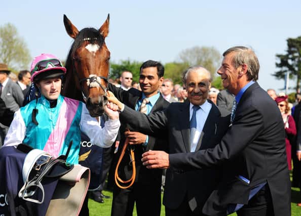 Prince Khalid Abdullah (second right) and Sir Henry Cecil (far right) after one of Frankel's many wins.