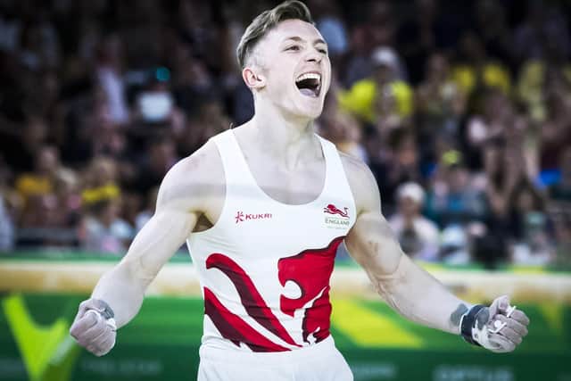 England's Nile Wilson (gold) celebrates following his routine on the Men's Horizontal Bar at the 2018 Commonwealth Games. Picture: Danny Lawson/PA