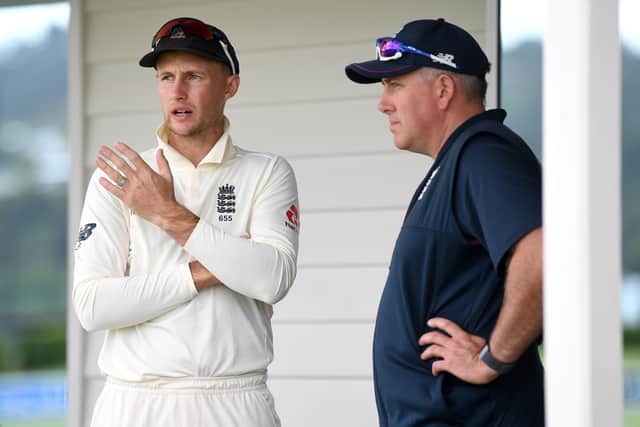 DECISIONS, DECISIONS: England captain Joe Root speaks with coach Chris Silverwood. Picture: Gareth Copley/Getty Images)