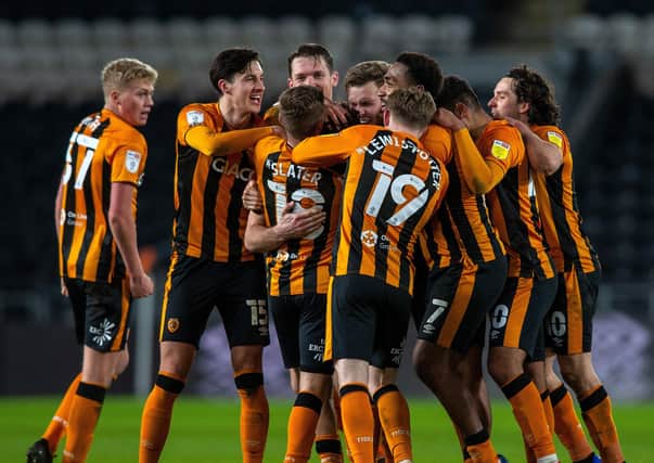 Lewie Coyle and Hull City celebrate his injury time winner against Fleetwood Town on Tuesday night at the KCOM Stadium.  Picture: Bruce Rollinson.