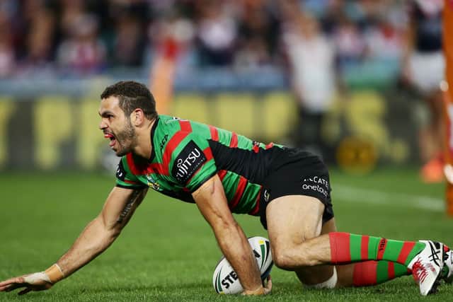 Greg Inglis performs his famous 'goanna' try celebration for South Sydney. (Photo: Getty Images)